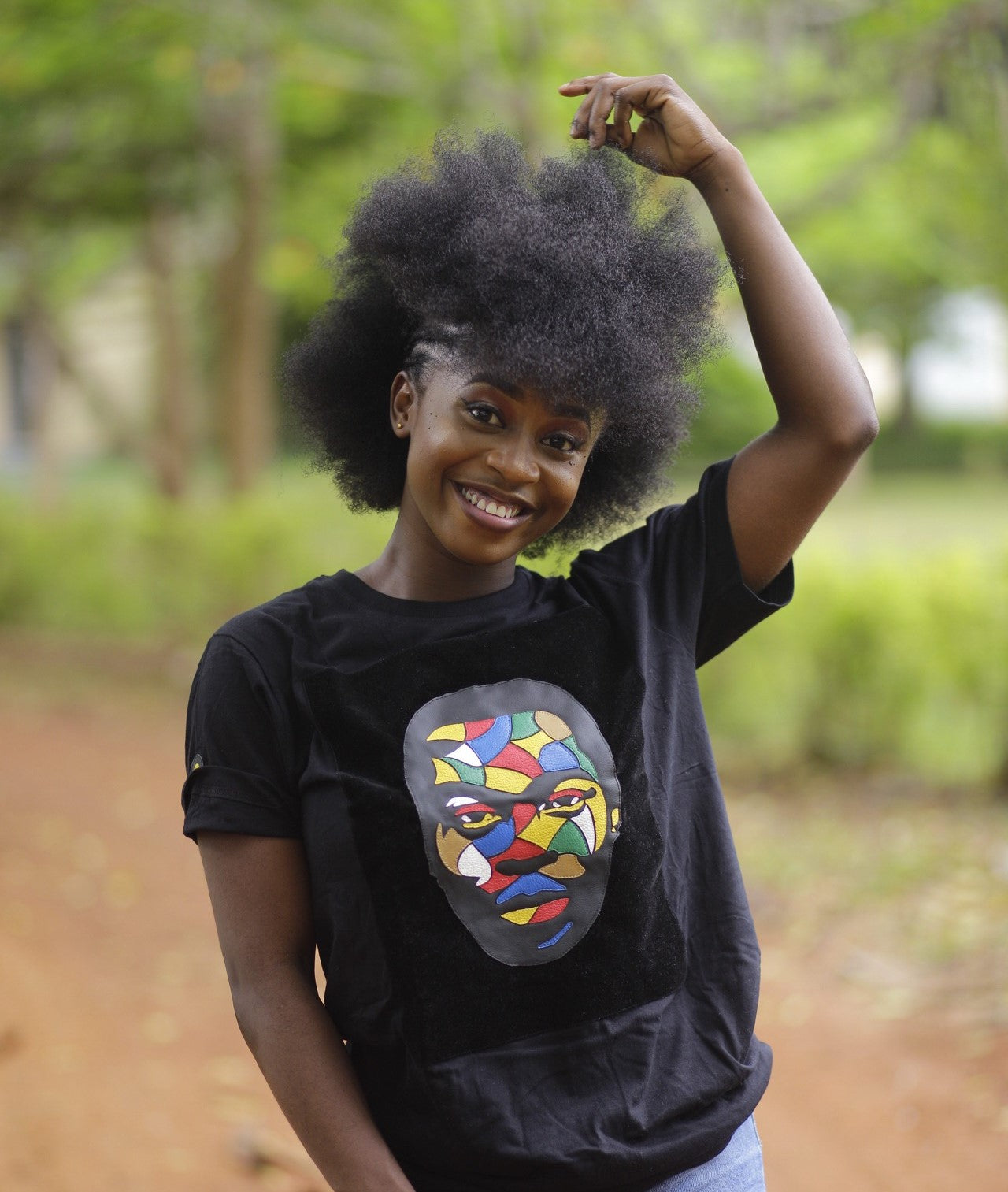 Fela Kuti Multicolored theme on black round neck t shirt