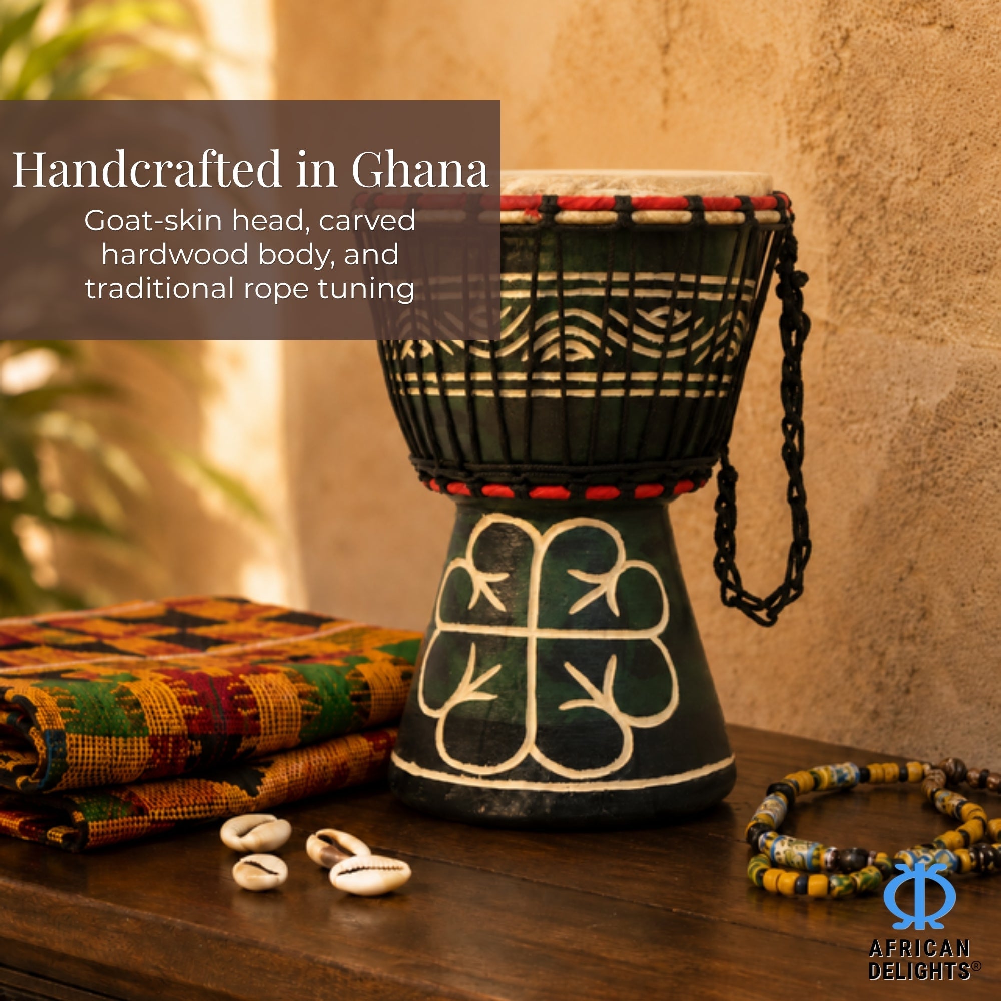 Authentic handcrafted Ghana djembe drum styled with kente cloth and cowrie shells