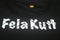 Fela Kuti black & white mosaic theme on black tank top